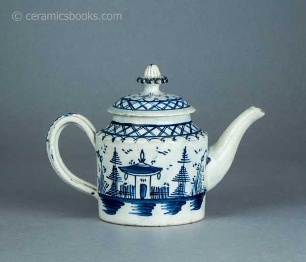 Pearlware cylindrical bachelor teapot with underglaze blue painted 'Chinese House' design. c.1785-1800. AP/1488. Reverse.