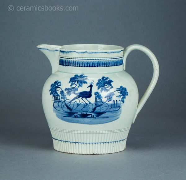 Pearlware jug with underglaze blue painted bird. Attributed to Swansea. c.1790-1810. AP/1511. Obverse.