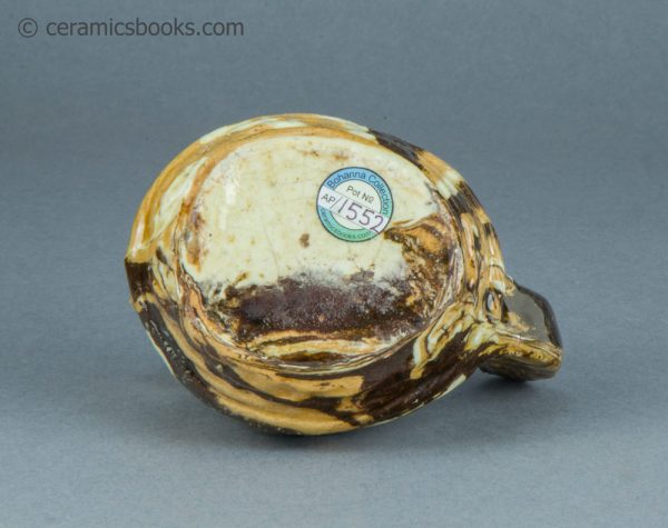 Agateware moneybox. Chicken in a basket. Attributed to Belfield Pottery. c.1870-1895. AP/1552. Base.