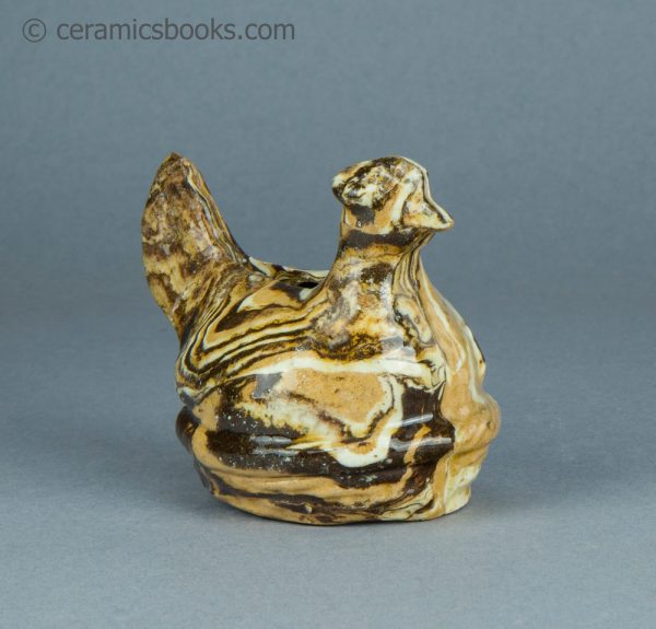 Agateware moneybox. Chicken in a basket. Attributed to Belfield Pottery. c.1870-1895. AP/1552. Reverse front.