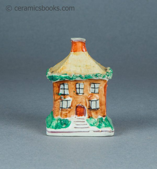 Tiny Staffordshire cottage moneybox. c1870-1920. AP/1617. Front.