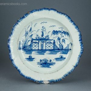 Pearlware shell edge plate. Underglaze blue painted 'Chinese house' pattern. Joshua Heath. c.1785-1800. AP/1703. Front.