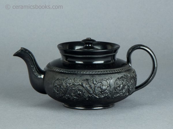 Black basalt teapot. Cyples. c.1820-1834. Obverse. AP/100.