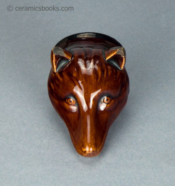 Treacleware fox head stirrup cup. c.1835-1865. AP/1062. Front.