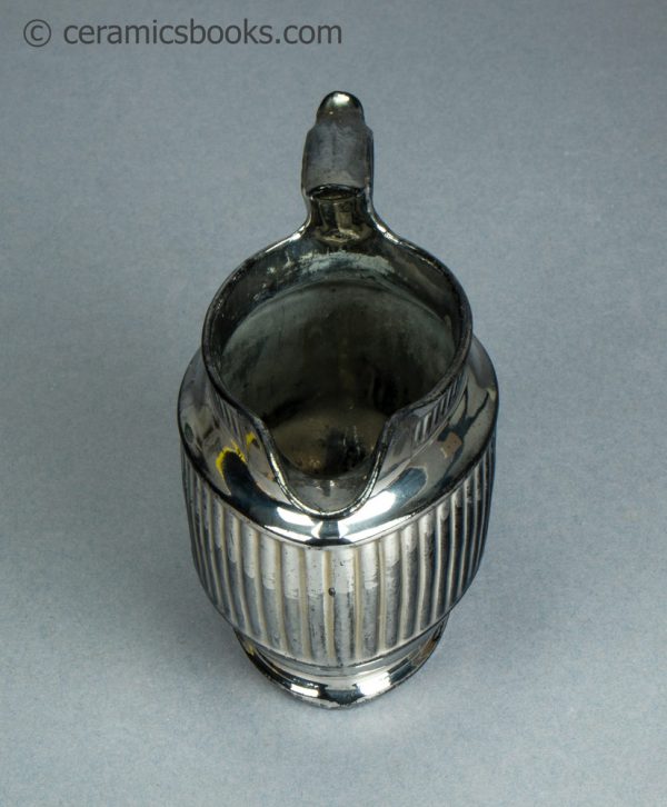 Silver lustreware cream jug with fluting. c.1820-1825. AP/1069. Above.