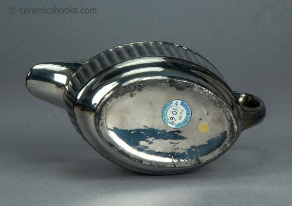 Silver lustreware cream jug with fluting. c.1820-1825. AP/1069. Base.