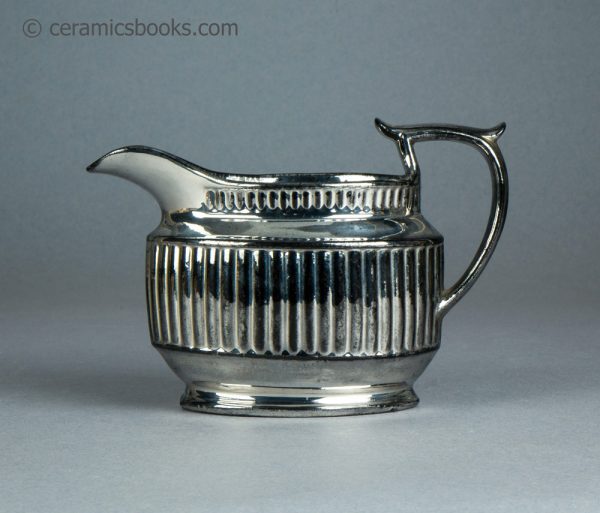 Silver lustreware cream jug with fluting. c.1820-1825. AP/1069. Obverse.
