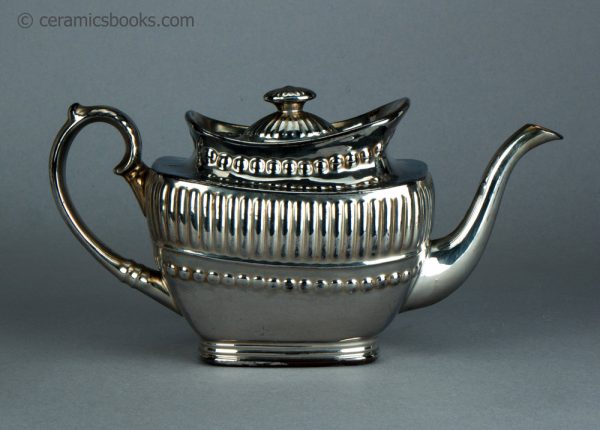 Silver lustreware teapot with ball and gadroon moulding. c.1820-1825. AP/1070. Reverse.