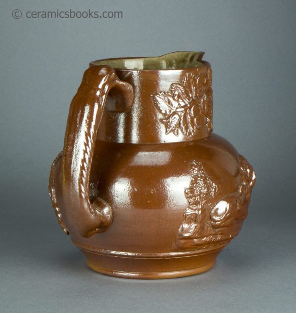 Brown saltglazed stoneware jug with Union and Oddfellows sprigs. Probably Brampton. c.1840-1850. AP/1355. Back.