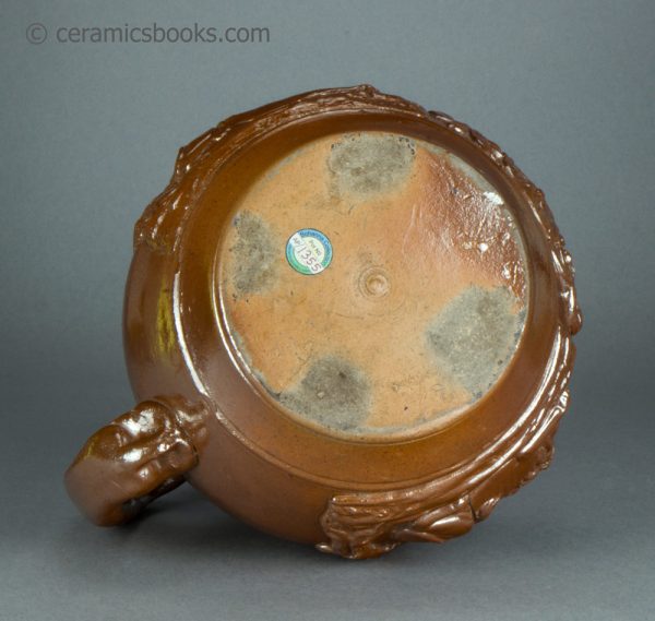 Brown saltglazed stoneware jug with Union and Oddfellows sprigs. Probably Brampton. c.1840-1850. AP/1355. Base.