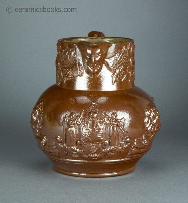 Brown saltglazed stoneware jug with Union and Oddfellows sprigs. Probably Brampton. c.1840-1850. AP/1355. Front.