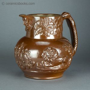 Brown saltglazed stoneware jug with Union and Oddfellows sprigs. Probably Brampton. c.1840-1850. AP/1355. Obverse angle.