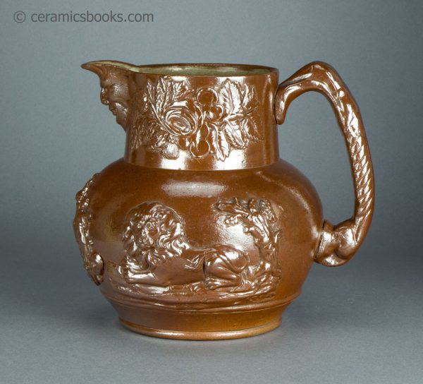 Brown saltglazed stoneware jug with Union and Oddfellows sprigs. Probably Brampton. c.1840-1850. AP/1355. Obverse.