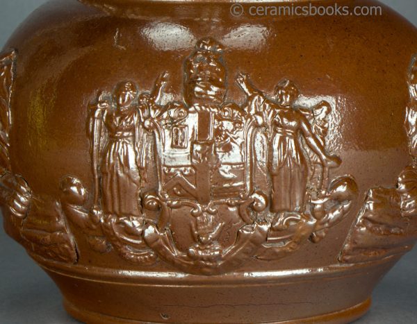 Brown saltglazed stoneware jug with Union and Oddfellows sprigs. Probably Brampton. c.1840-1850. AP/1355. Front sprig.