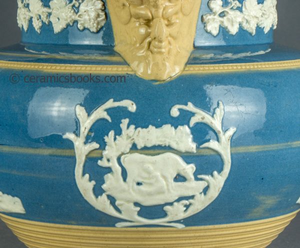 Large yellowware jug with blue slip ground and white sprigs. c.1840-1860. AP/1411. Front sprig.