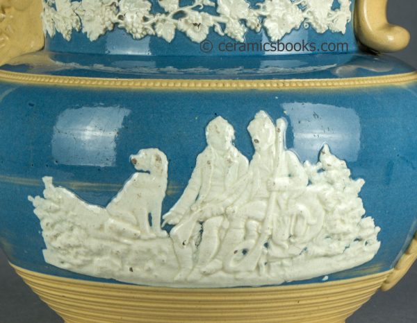 Large yellowware jug with blue slip ground and white sprigs. c.1840-1860. AP/1411. Obverse sprig.