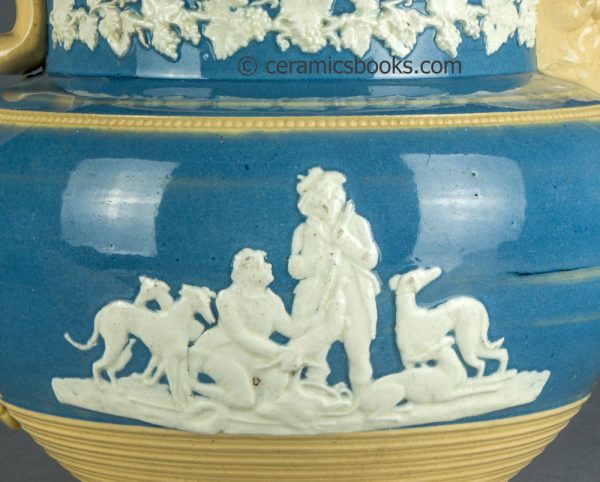 Large yellowware jug with blue slip ground and white sprigs. c.1840-1860. AP/1411. Reverse sprig.