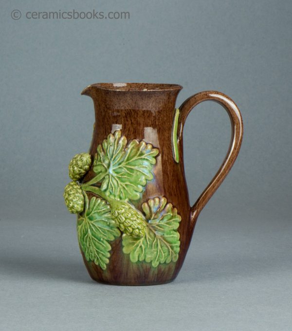 Belle Vue Pottery, Rye, Sussex, earthenware jug with hop sprigs. c.1870-1920. AP/1568. Obverse.