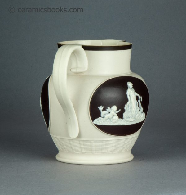 Felspathic stoneware jug with sprigs inside brown slip cartouches. Chetham & Woolley. c.1800-1810. AP/1643. Back.