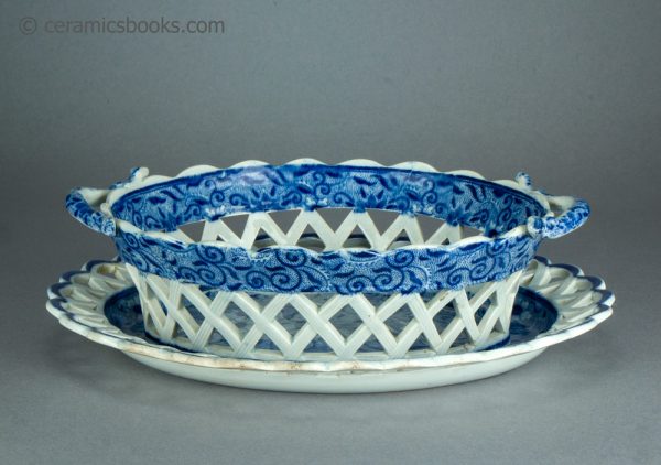 Pearlware chestnut basket and dish. Blue transfer printed 'Tendril' pattern. c.1810-1830. AP/1719/1720. Side.