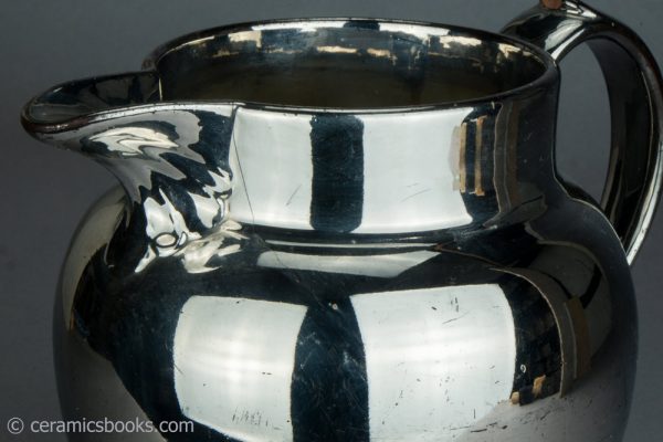 Silver lustreware jug. c.1820-1830. AP/386. Hairline.