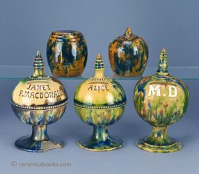 Group of Scottish moneyboxes including Morrison & Crawford. c.1880-1910.